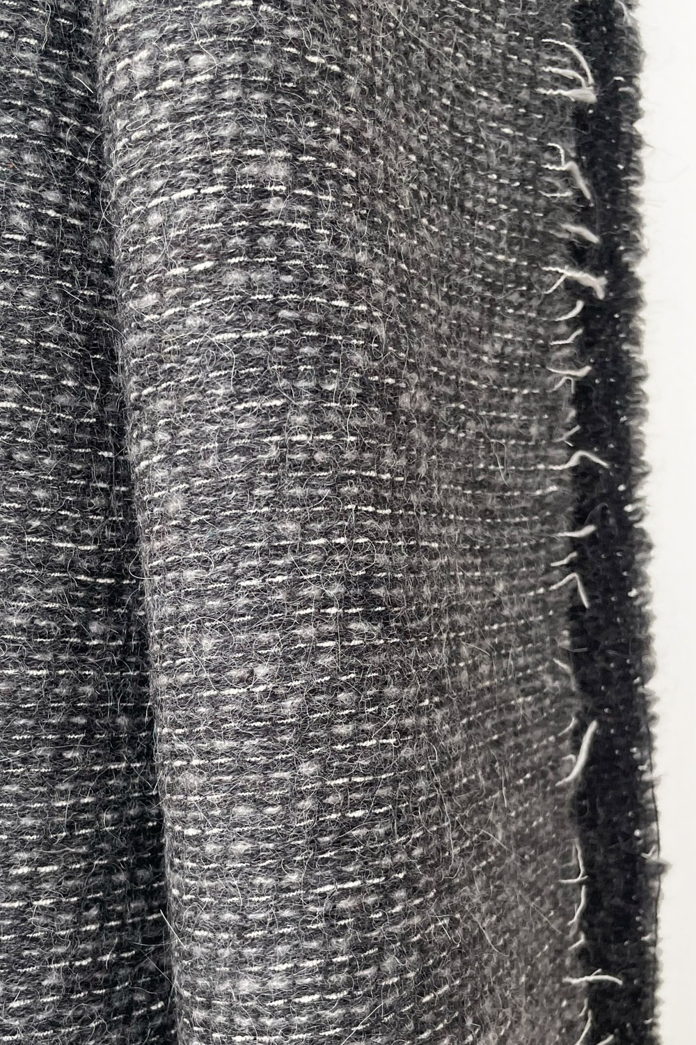 Pilkku alpakka, nurja puoli